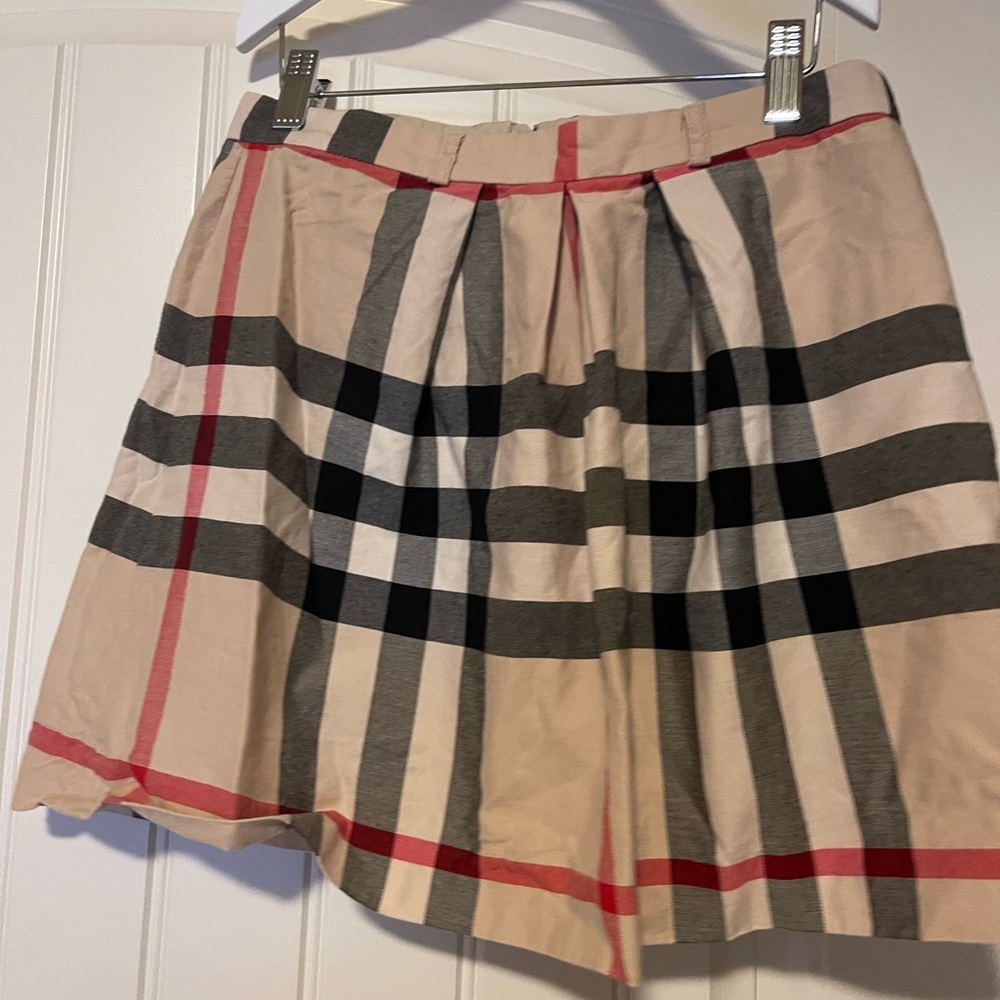 Sold***Authentic Burberry girl skirt size 14